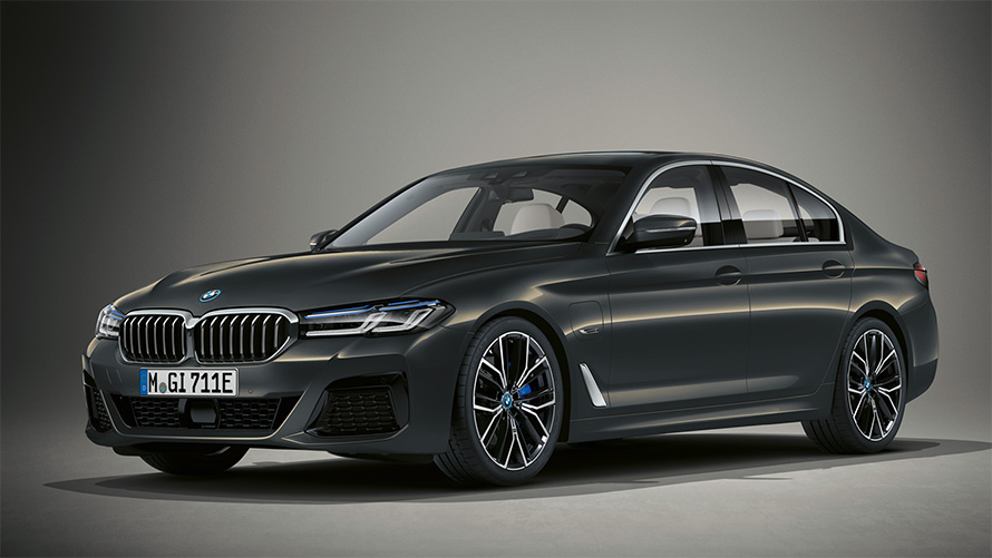 BMW 5 Series Sedan Individual G30 Facelift 2020 three-quarter front view standing in BMW Individual Dravite Grey metallic