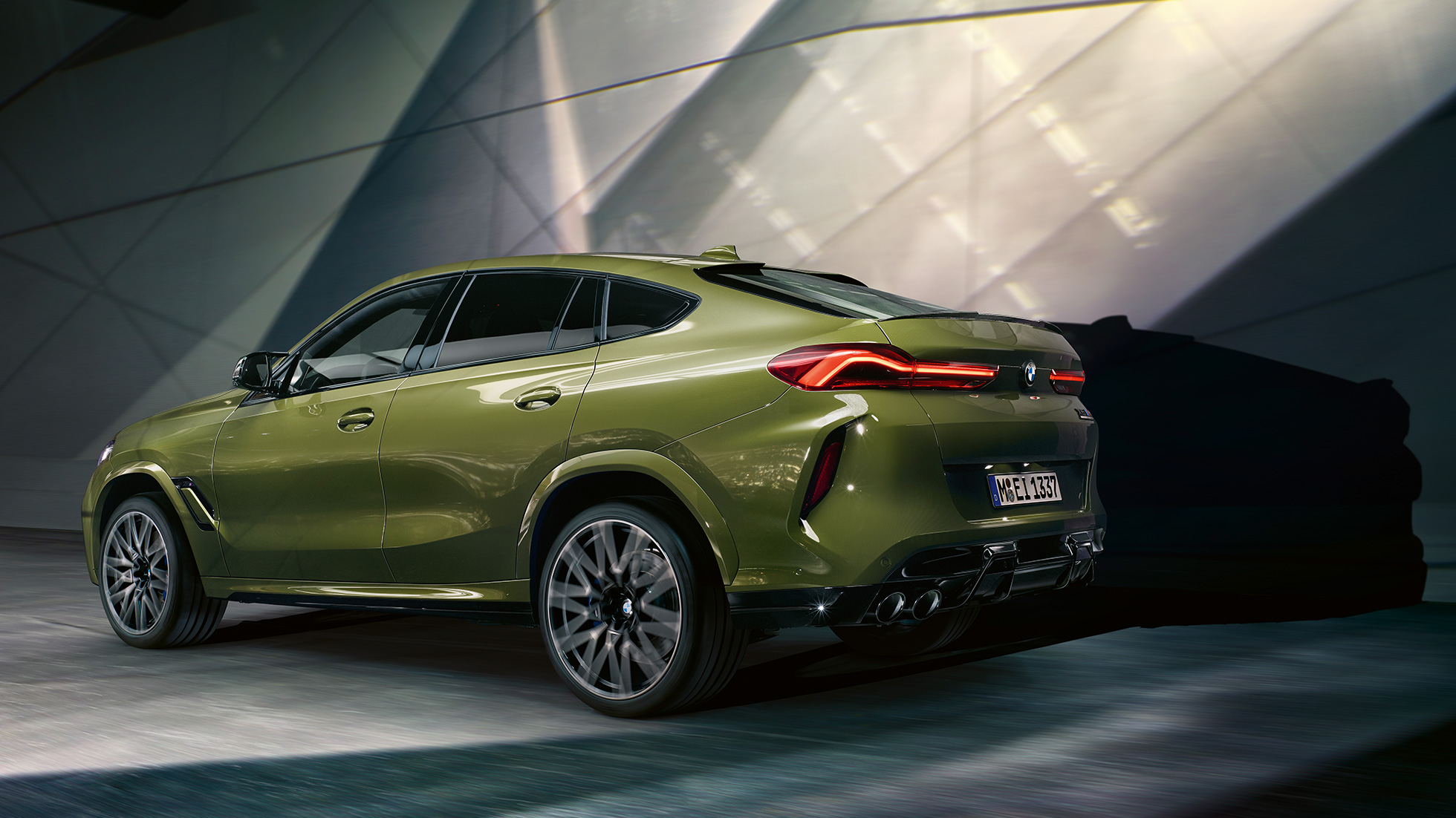 BMW X6 M Competition with M xDrive BMW X6 M Competition with M xDrive F96 2020 BMW Individual Special Paint Urban Green SUV three-quarter rear view