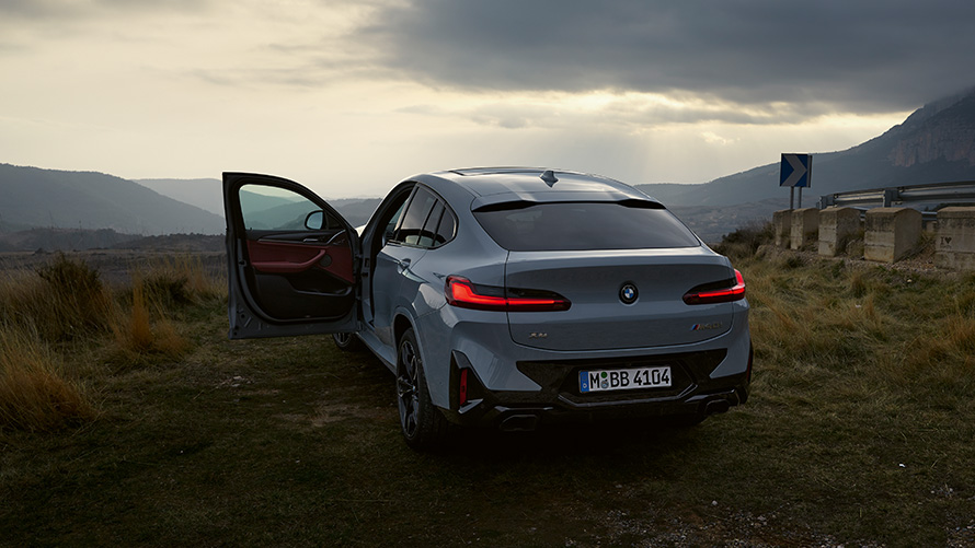 BMW X4 G02 Financial Services Brooklyn Grey three-quarter rear view standing 2021