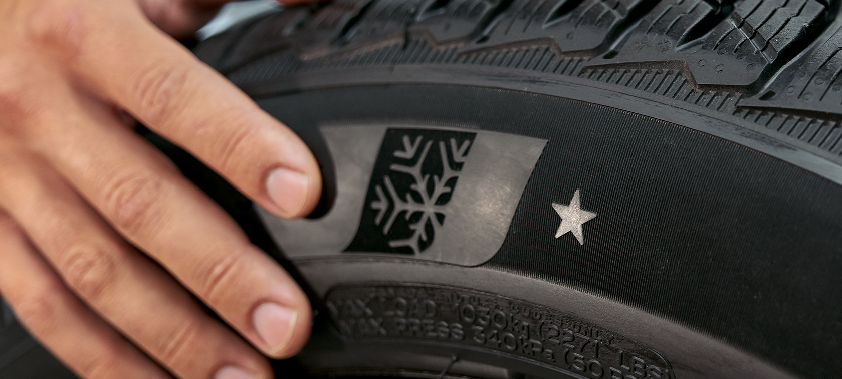 BMW winter complete wheel with star marking Close up view of a BMW winter complete wheel with star marking