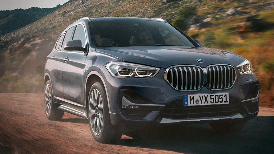 BMW X1 xDrive20i F48 LCI in BMW Individual Storm Baymetallic, driving in winter landscape BMW X1 xDrive20i F48 LCI in BMW Individual Storm Baymetallic, driving in winter landscape